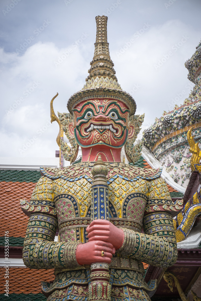 Giant statue at Temple of the Emerald Buddha (Wat phra kaew) ,Bangkok,Thailand.