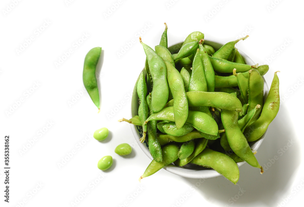 green soybeans on white background green soybeans on white background