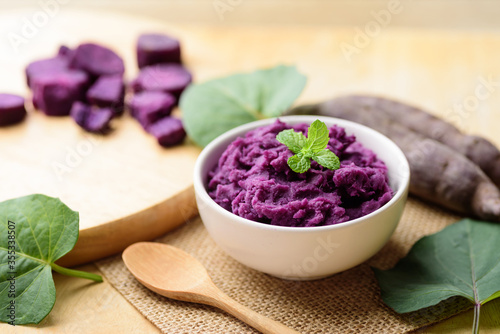 Fototapeta Naklejka Na Ścianę i Meble -  Mashed purple sweet potatoes in a bowl, Healthy food