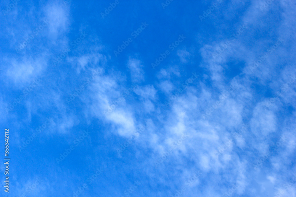 beautiful photos of the blue sky on a clear day with clean white clouds, a combination of blue and white and sparkling sunlight add a sense of enthusiasm for outdoor activities