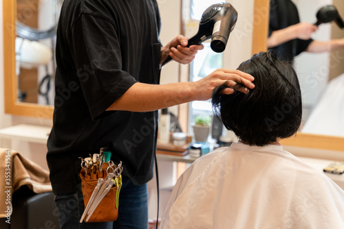 Filming the work of a Japanese barber