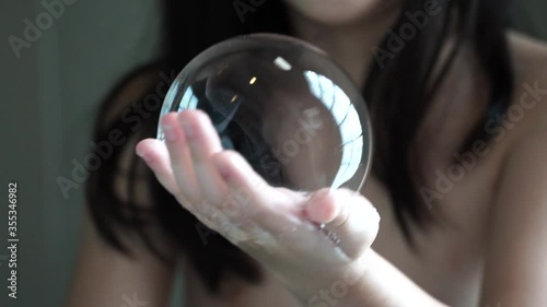 Soap bubble popping,