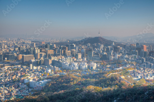 Photography Sunset view of Namsan tower overlooking downtown Seoul, Republic of Korea
