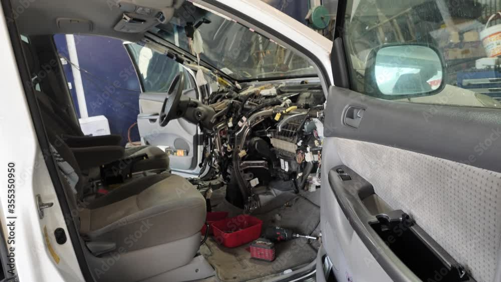 Inside car while repair process, disassembled cockpit Inside car while repair process, disassembled cockpit