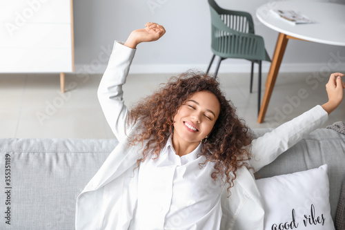 Relaxed young woman stretch...