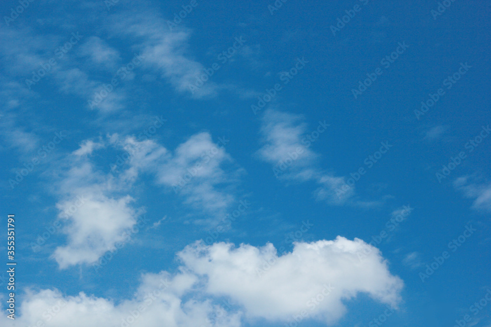 beautiful photos of the blue sky on a clear day with clean white clouds, a combination of blue and white and sparkling sunlight add a sense of enthusiasm for outdoor activities