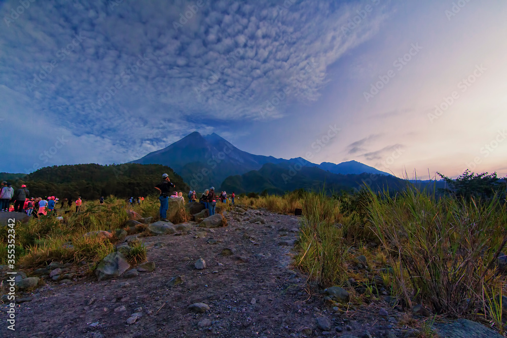 Merapi, Yogyakarta - August 18th, 2017: A lot of people gathering to watch sunrise from Merapi mountain. Merapi has been a local tourism spot in Yogyakarta