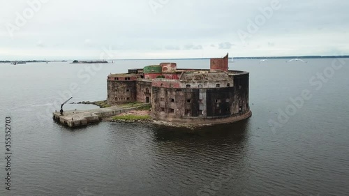 4K aerial cloudy morning video of Fort Alexander 1 bastion, its fortifications, armaments and Baltic Sea Finnish Bay panorama near Kronstadt and Saint Petersburg in northern Russia