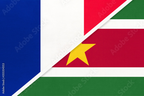 France and Suriname, symbol of national flags from textile. Championship between two countries.