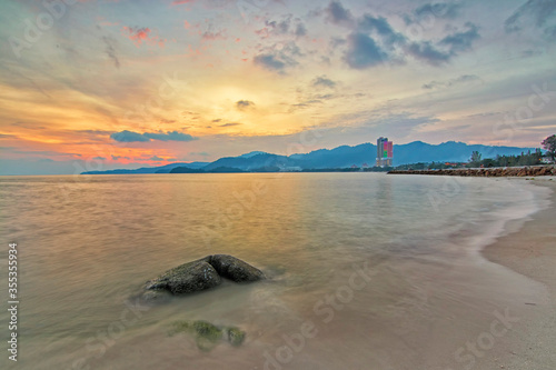 Beautiful sunset view shot taken using long exposure technique to get the smooth water movement effect