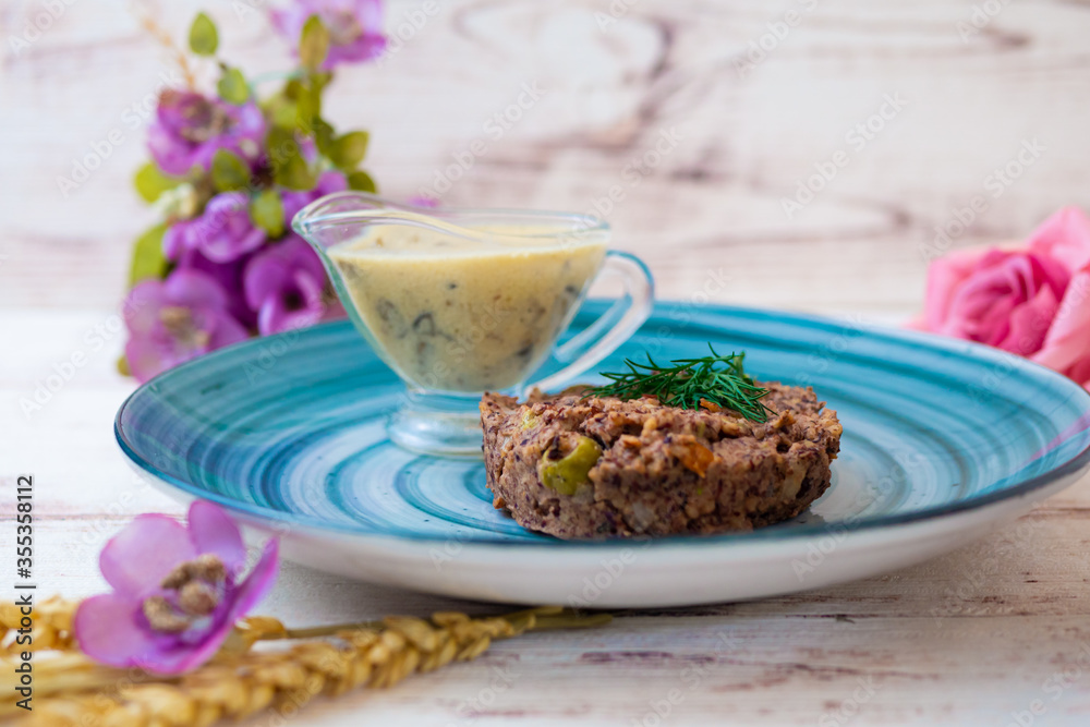 healthy food vegetarian cutlet decorated with greens