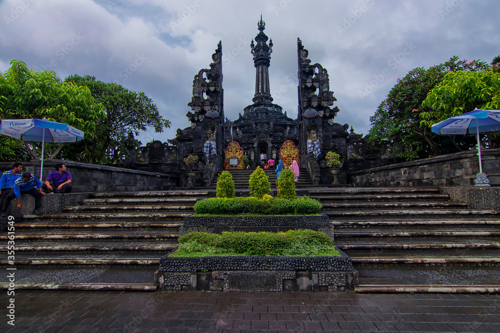 Bali, Indonesia - November 23rd, 2017: Great architectural design of an enterance to a museum in Bali. Its is well guarded by the local authorities for the touristi safety assuarance.