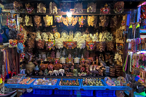 Long exposure shot of a stall selling unique souvenir from Sanur Beach, Bali with overexpose effect due to high intensity of the light