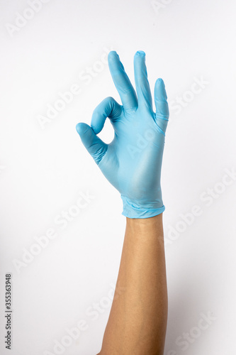 blue gloves for germs of medical personnel and the general public, raising their hands, raising their arms, joining forces