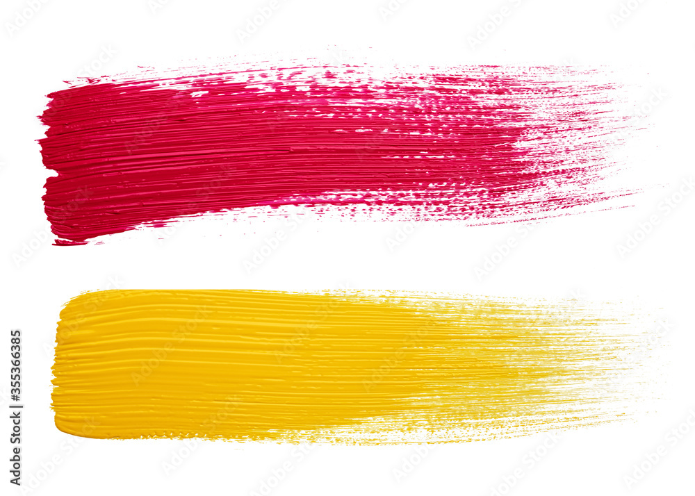 Brush strokes of yellow and red paint isolated on white Brush strokes of yellow and red paint isolated on white