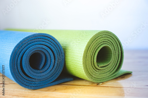 Yoga mats, two rolls, blue-green