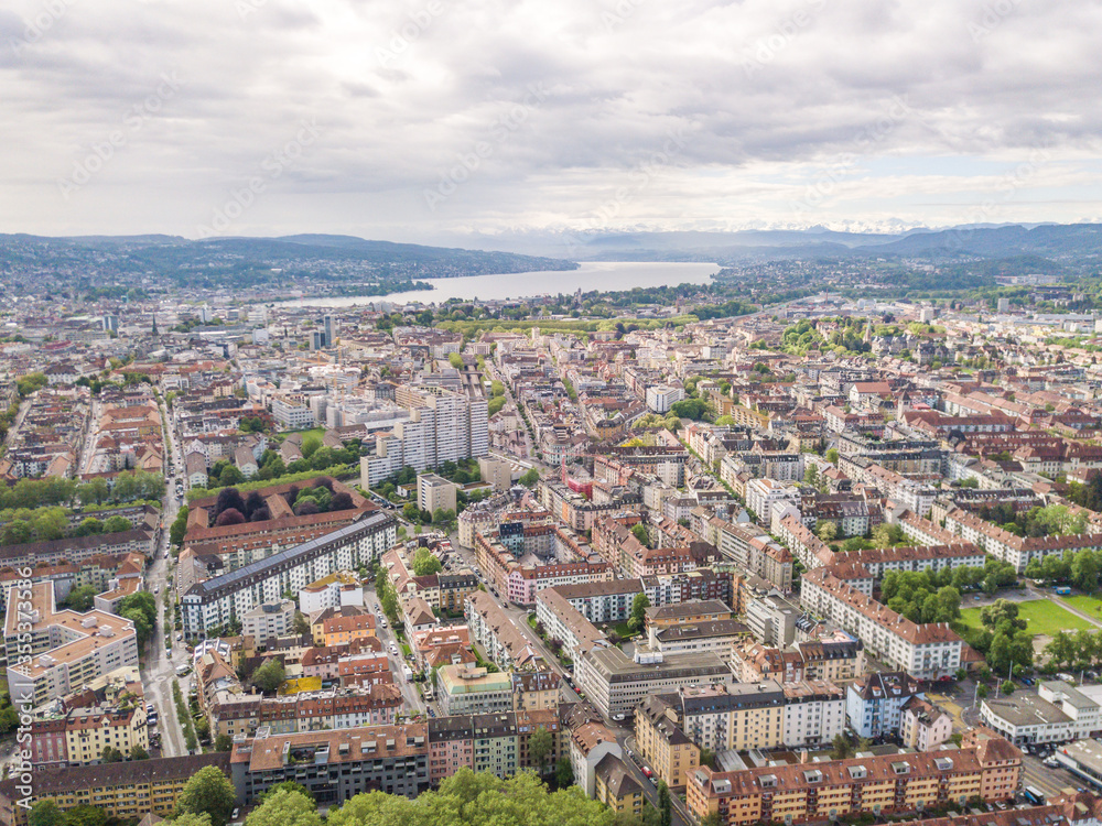Panoramic aerial view of city of Zurich in Switzerland. Densely populated area with many buildings. Travel destination in Europe.