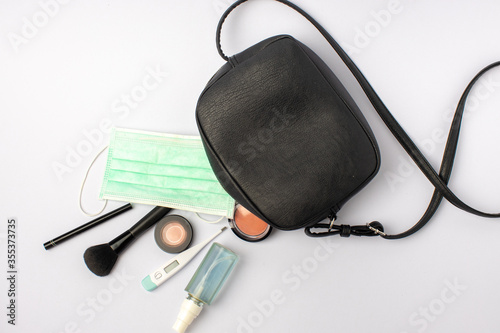 black bag of women during covid alcohol gel mercury mass cosmetics cheek brush