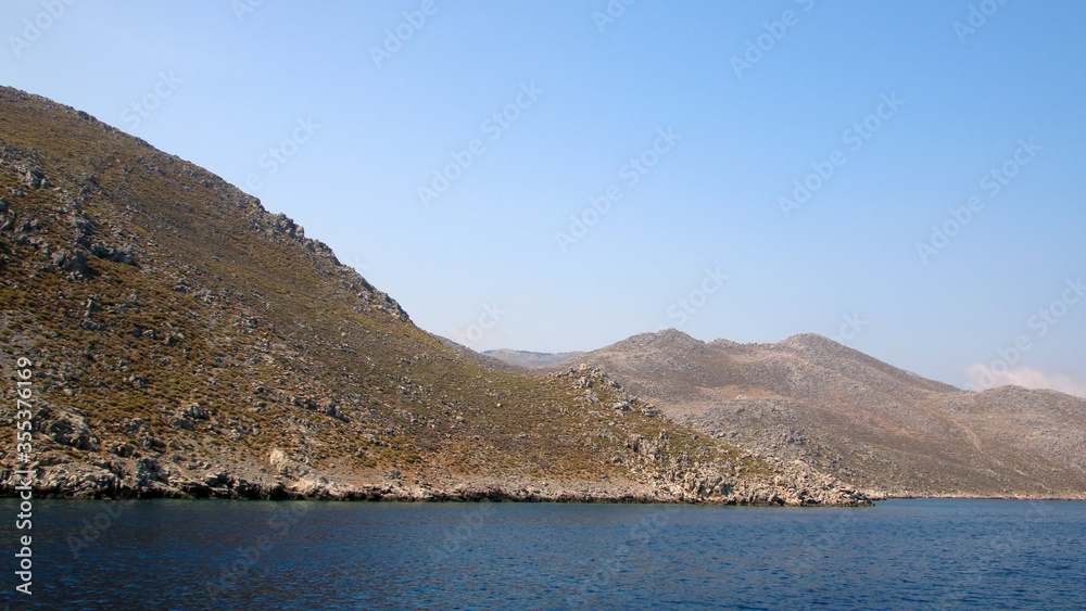 Rocky seashore of Symi Island, the Aegean Sea, Greece