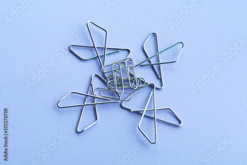 paper clips . The idea for the design of school notebooks.