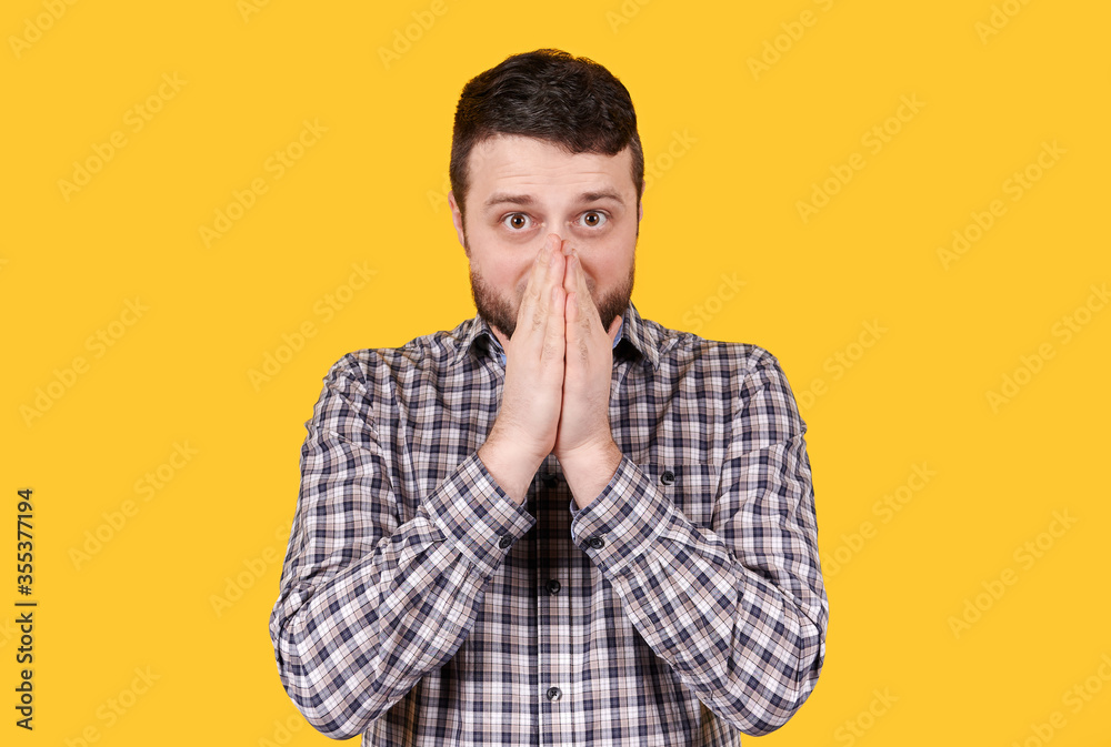 Man with beard shocked, isolated on yellow background. Man with beard shocked, isolated on yellow background.