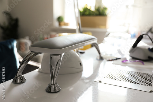 Professional equipment for manicure on table in beauty salon