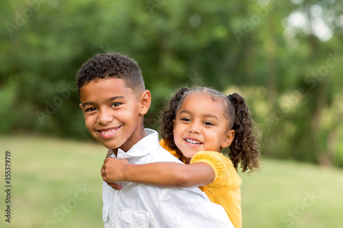 Konstfotografi Portrait of a big brother and his little sister.