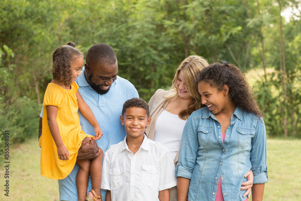 Portrait of a multi ethnic family laughing. Portrait of a multi ethnic family laughing.