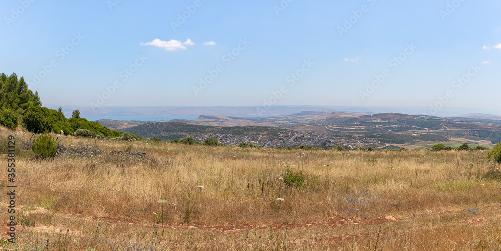 View  from the hill on which the Lavra Netofa monastery is located on the steppe, forests and hills surrounding Lake Kinneret