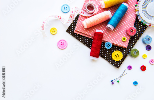 Sewing accessories on a white background