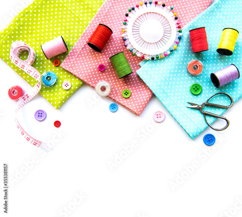 Sewing accessories on a white background