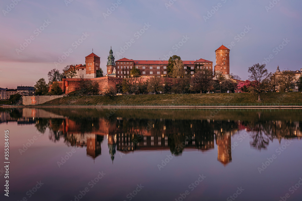 View of the Wawel Castle in Krakow, Poland right after sunset.