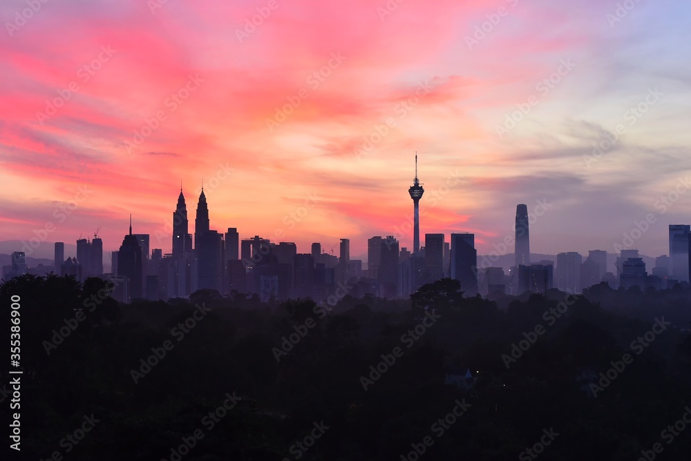 Fototapeta premium Beautiful sunset over Kuala Lumpur cityscape