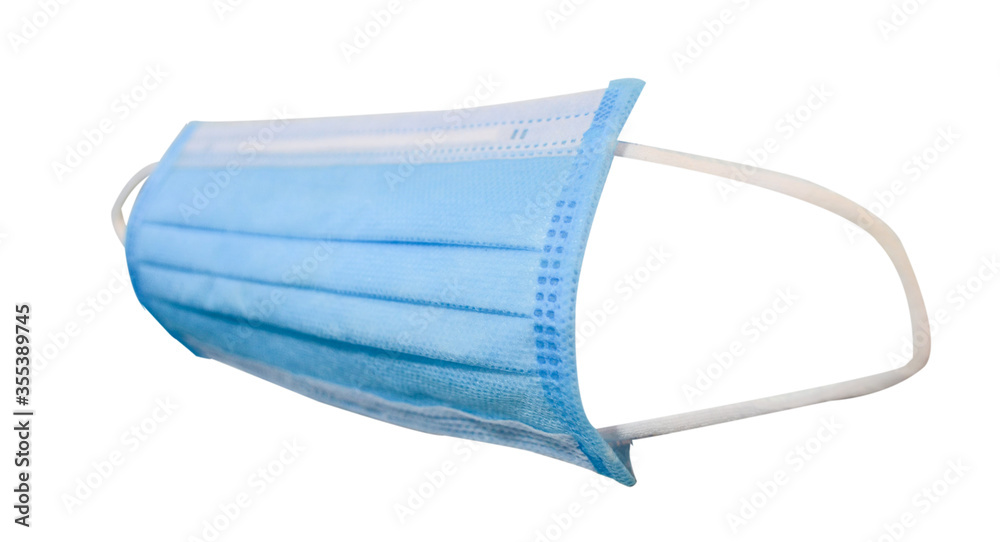 Side of blue surgical face mask on white background with clipping path. Side of blue surgical face mask on white background with clipping path.