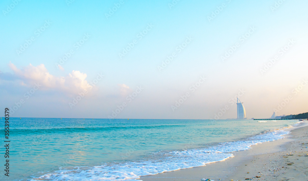 Φωτογραφία Beautiful landscape of Al Sufouh Beach, one of Dubai's hidden gems, also known as “Secret Beach and Black Palace Beach with iconic Burj Al Arab in the background