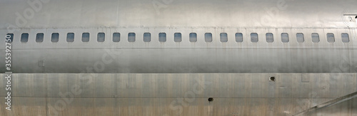 Abandoned airplane windows from outside.