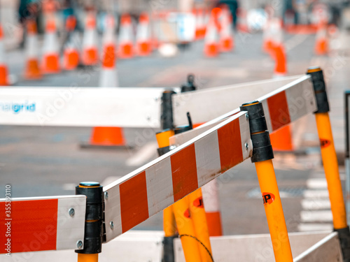 Road works on busy street due to carriageway repairs.