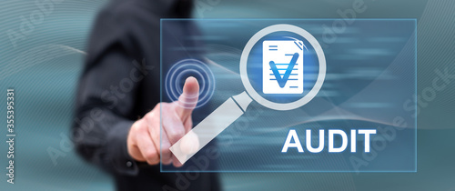 Man touching an audit concept