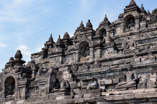 Statues and Stupas of the Borobudur Temple, West Java, Indonesia (750AD) photo