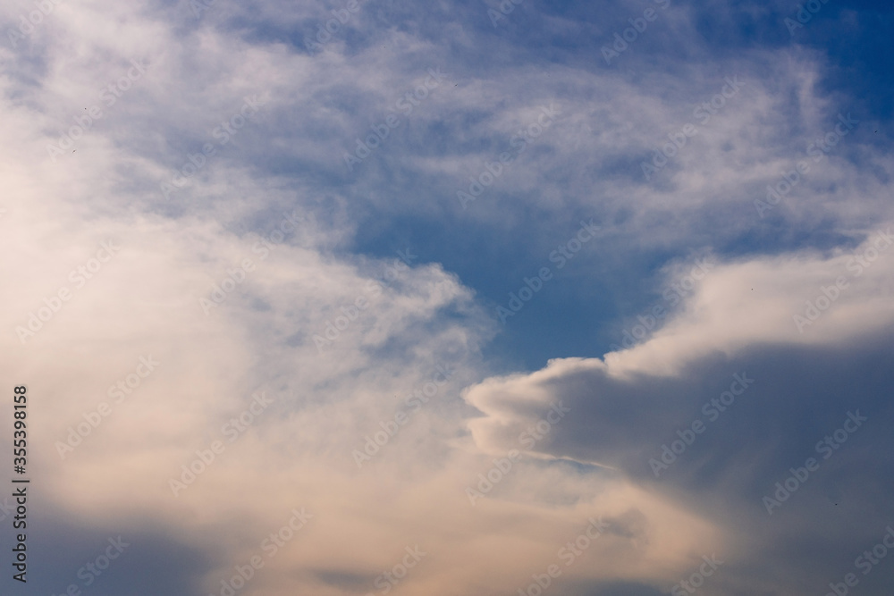Beautiful sky, clouds of different and interesting shapes. Background Beautiful sky, clouds of different and interesting shapes. Background