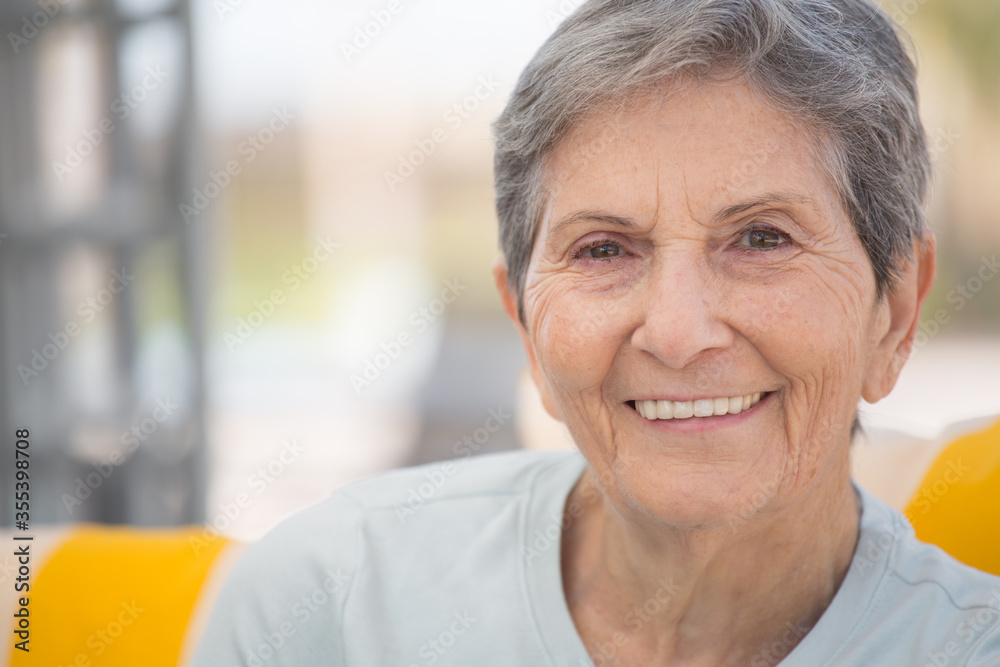 Portrait of a mature elderly woman smiling. Portrait of a mature elderly woman smiling.