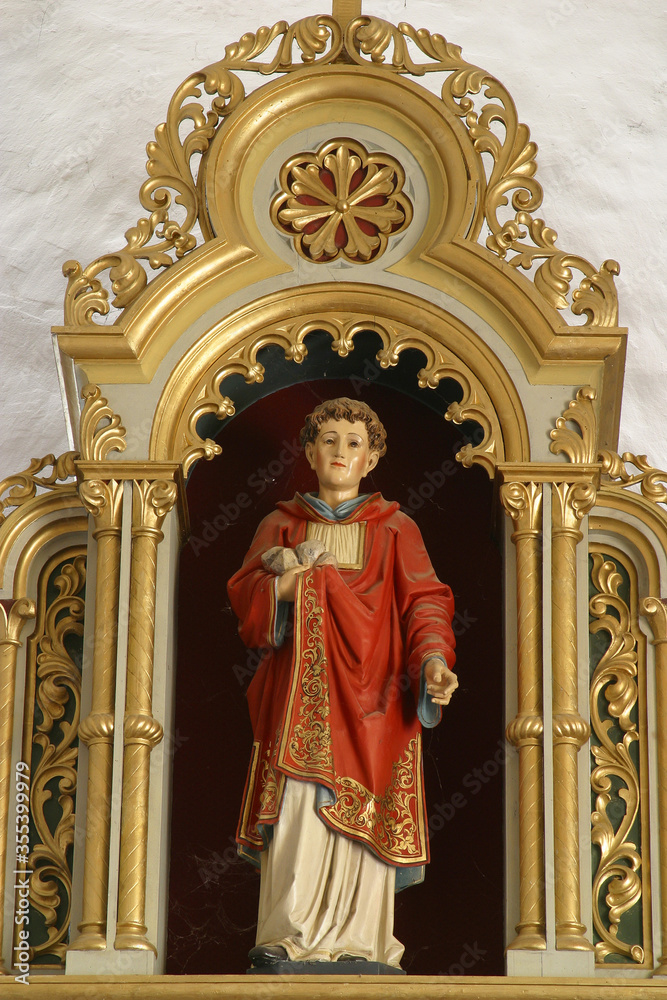 St. Stephen statue on the main altar in the church of St. Stephen the Protomartyr in Stefanje, Croatia