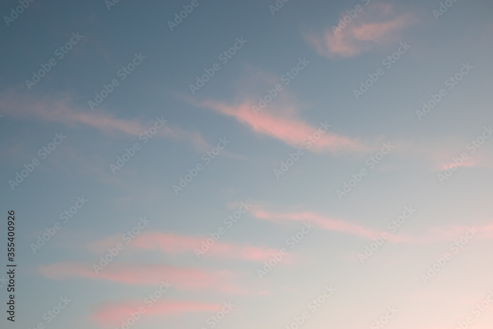 Pink clouds during sunset during an almost cloudless day at Cantabria, Suances