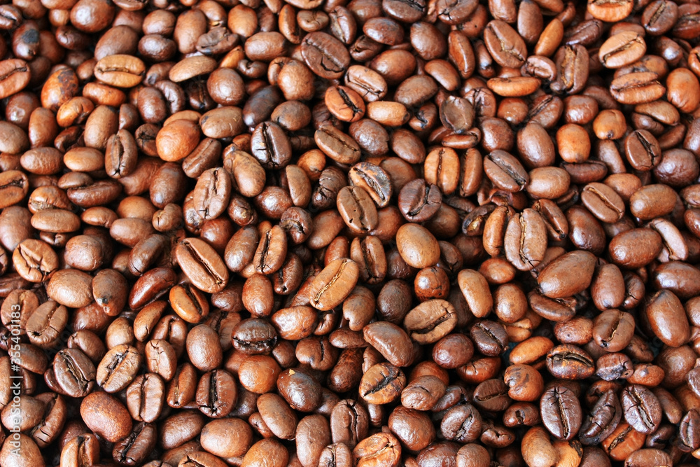 Coffee beans lie on the table Coffee beans lie on the table