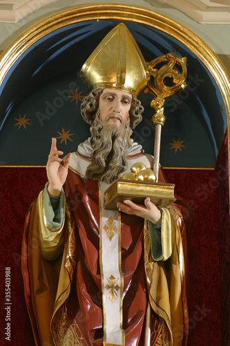 Saint Nicholas, statue on the main altar in the parish church of Saint Nicholas in Donja Zelina, Croatia photo