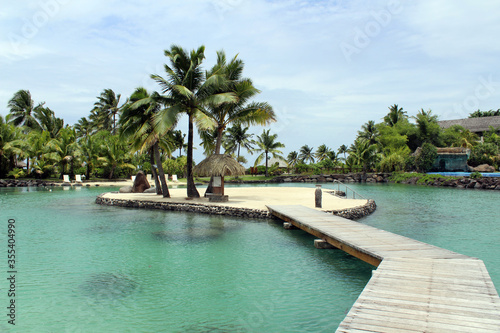 Fototapeta Naklejka Na Ścianę i Meble -  Relaxing on vacation in Tahiti resort in French Polynesia