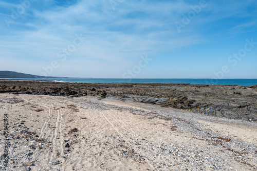 Empty Large Rocky Coastal Seaside Scene and Beach on a Sunny Day