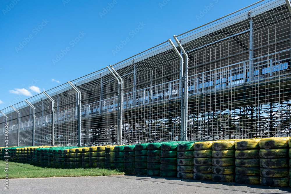 Obraz premium Security and Shock Dampeners Tires on a Motorsports Racing Track