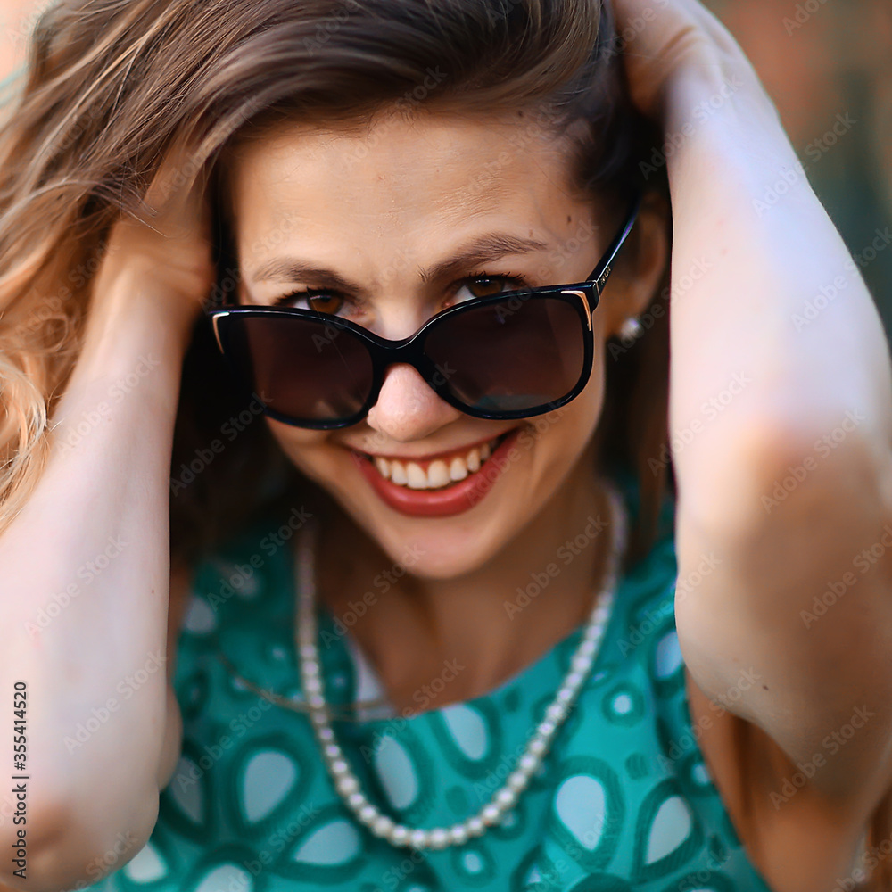 cheerful blonde in sunglasses / young beautiful girl, sunglasses, woman summer look cheerful blonde in sunglasses / young beautiful girl, sunglasses, woman summer look