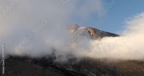 Teide volcano on Tenerife, Canary Islands, surrounded by clouds. photo